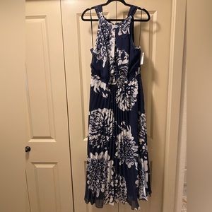 Halter style dress w/pleated skirt